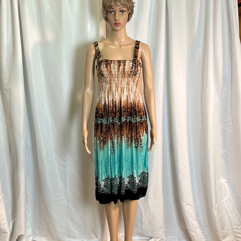 Sleeveless extra large, gorgeous dress by romantic sini has multi colors